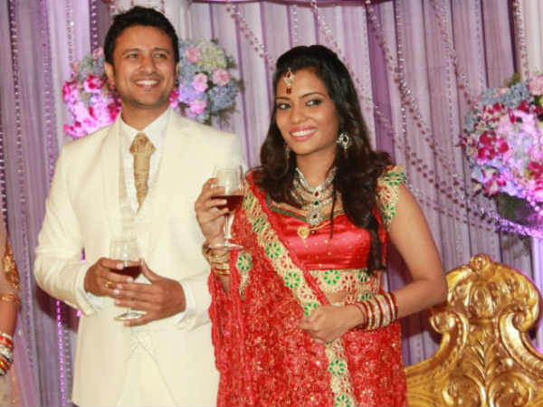 Raja Abel, Amritha Posing With Wine Glasses