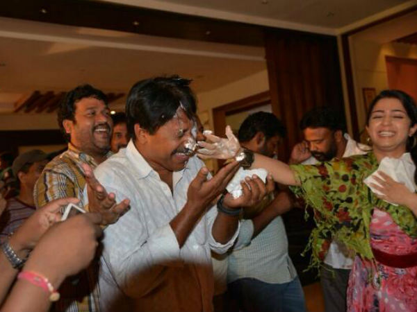 Charmi Kaur Feeding Cake To Mantra 2 Co-Director