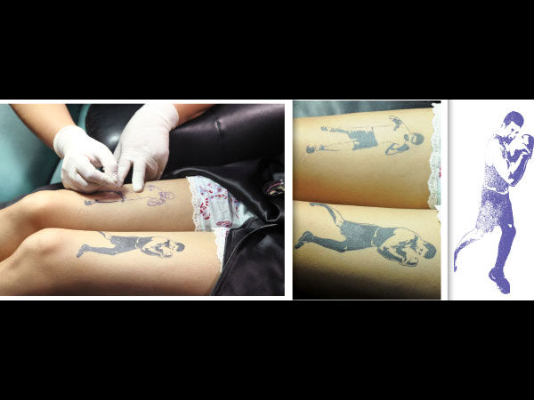 A Close Up Picture Of The Tattoos